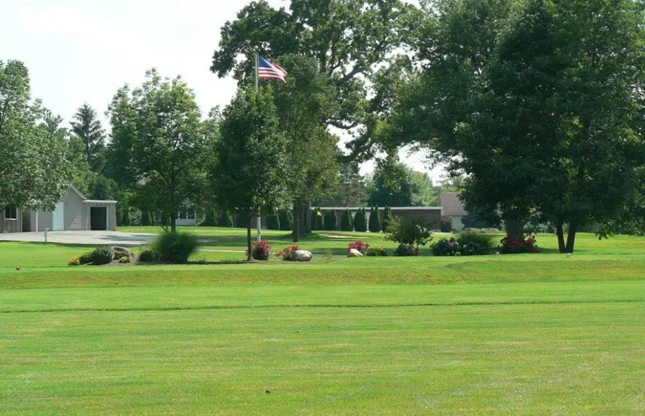 Fairway view with American flag at The Greens